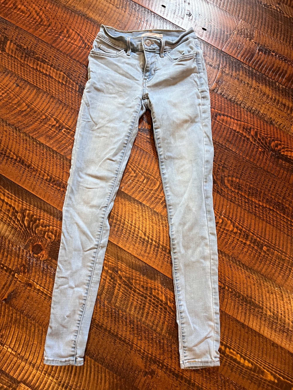 Levi’s Light Wash Super Skinny 710 Jeans - Pale Blue. Size 24